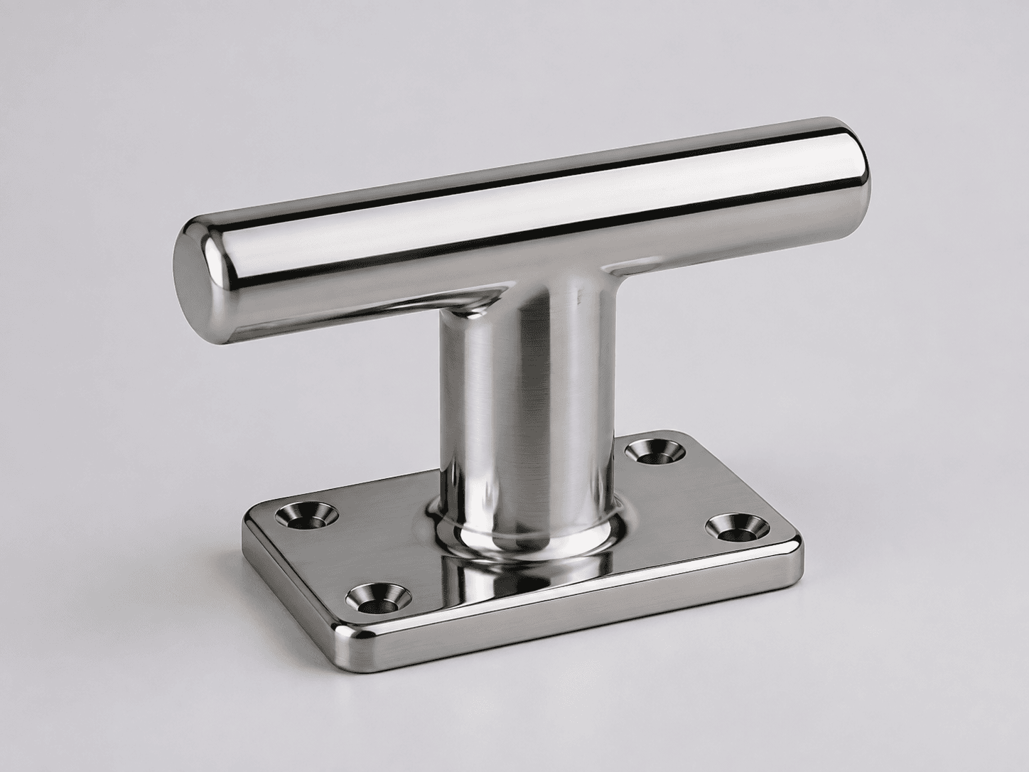 Product-type illustration of a polished T-bollard on a rectangular mounting base