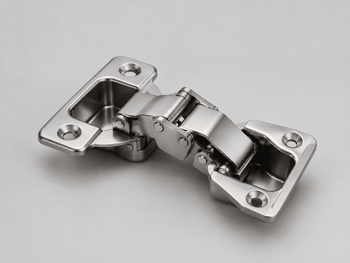 Product-type illustration of an articulated concealed hinge with two recessed mounting cups