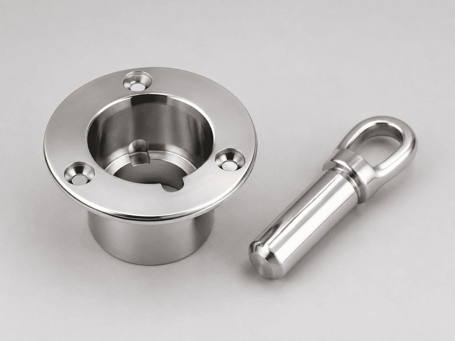 Product-type illustration of a removable accessory connection with a deck socket and eyelet pin